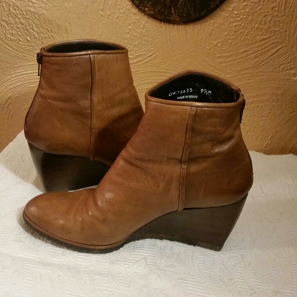 Stuart Weitzmann leather wedge heel booties.